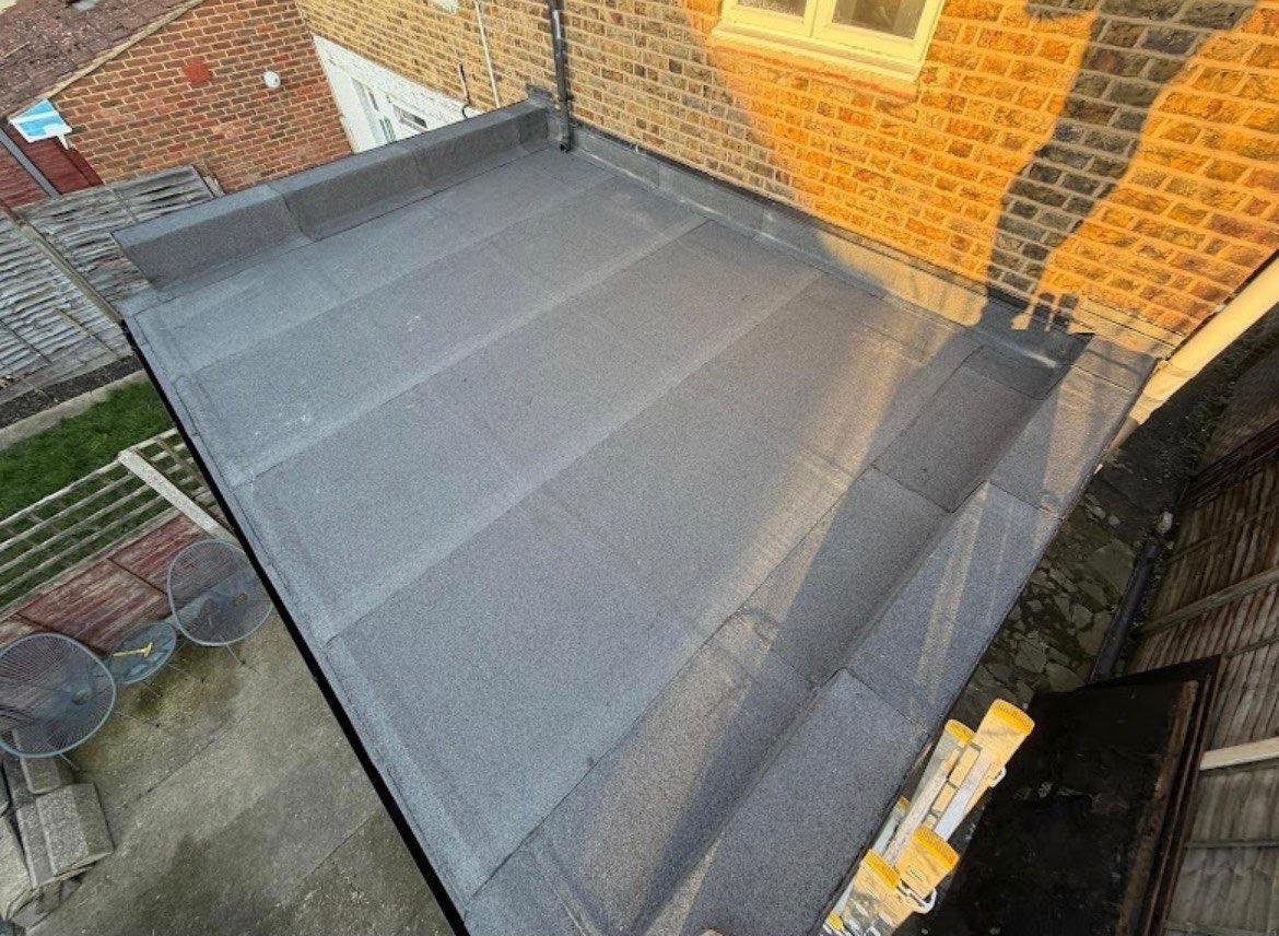 Finished flat roof with neat upstand and edge detail