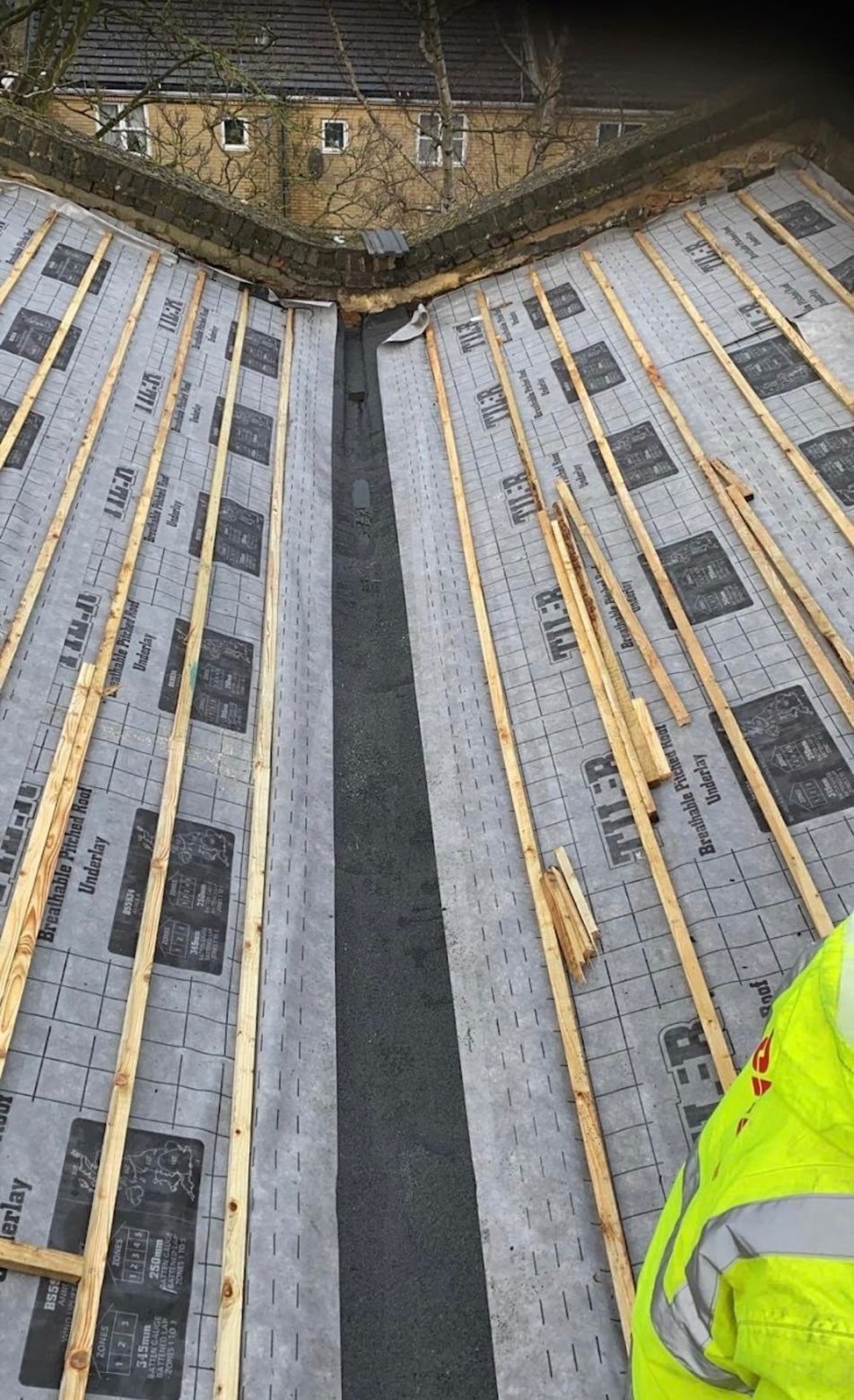 Roof preparation with breathable felt battens and valley detail